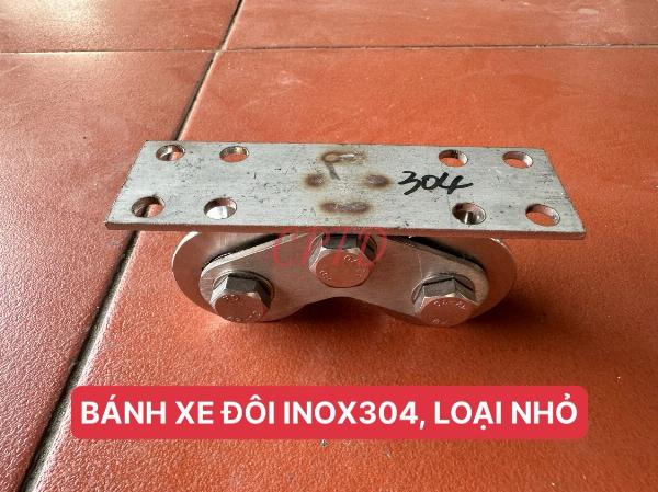 BÁNH XE ĐÔI CỬA ĐI LÙA